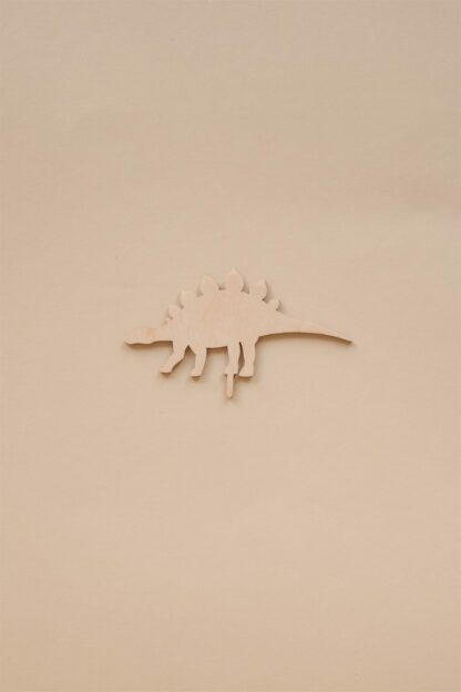 Auf diesem Bild sieht man einen Dino Stegosaurus als Stecker für den Geburtstagskranz.