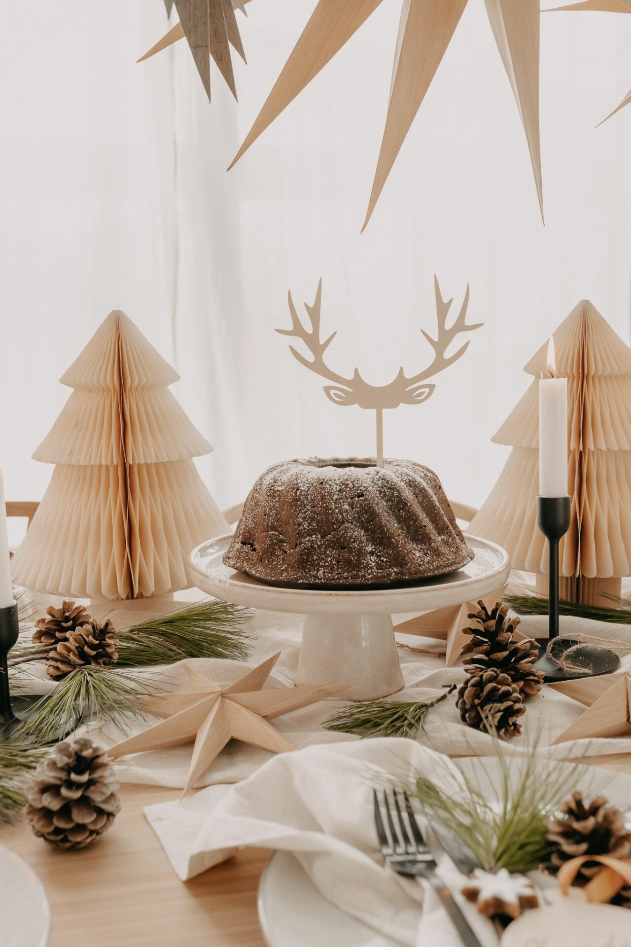 Cake Topper Weihnachten aus Holz in Form von einem Geweih.