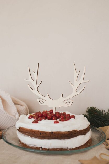 Cake Topper zur Weihnachtszeit mit einem Geweih.